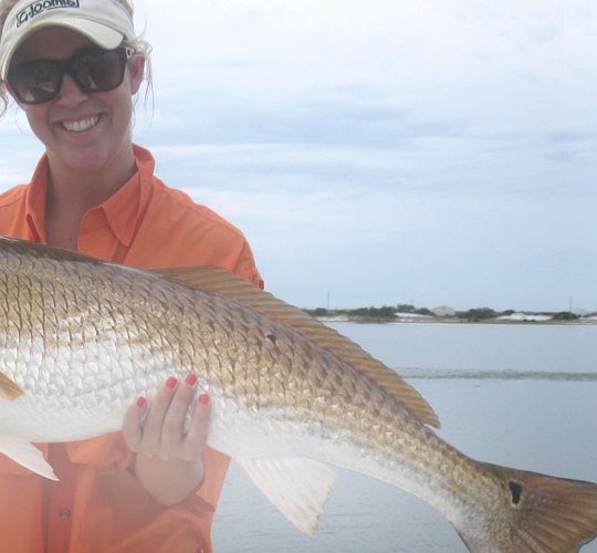 Angler with a large bull redfish